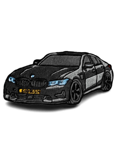A detailed hand-tufted portrait of a BMW in black and grey tones, capturing sharp body lines, blue-tinted headlights, and fine shading. A striking custom piece for car enthusiasts.