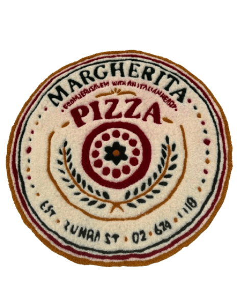 A hand-tufted circular rug styled like a Margherita pizza box seal, with a gold-rimmed border, laurel wreath, and bold lettering. A playful, food-themed statement piece.